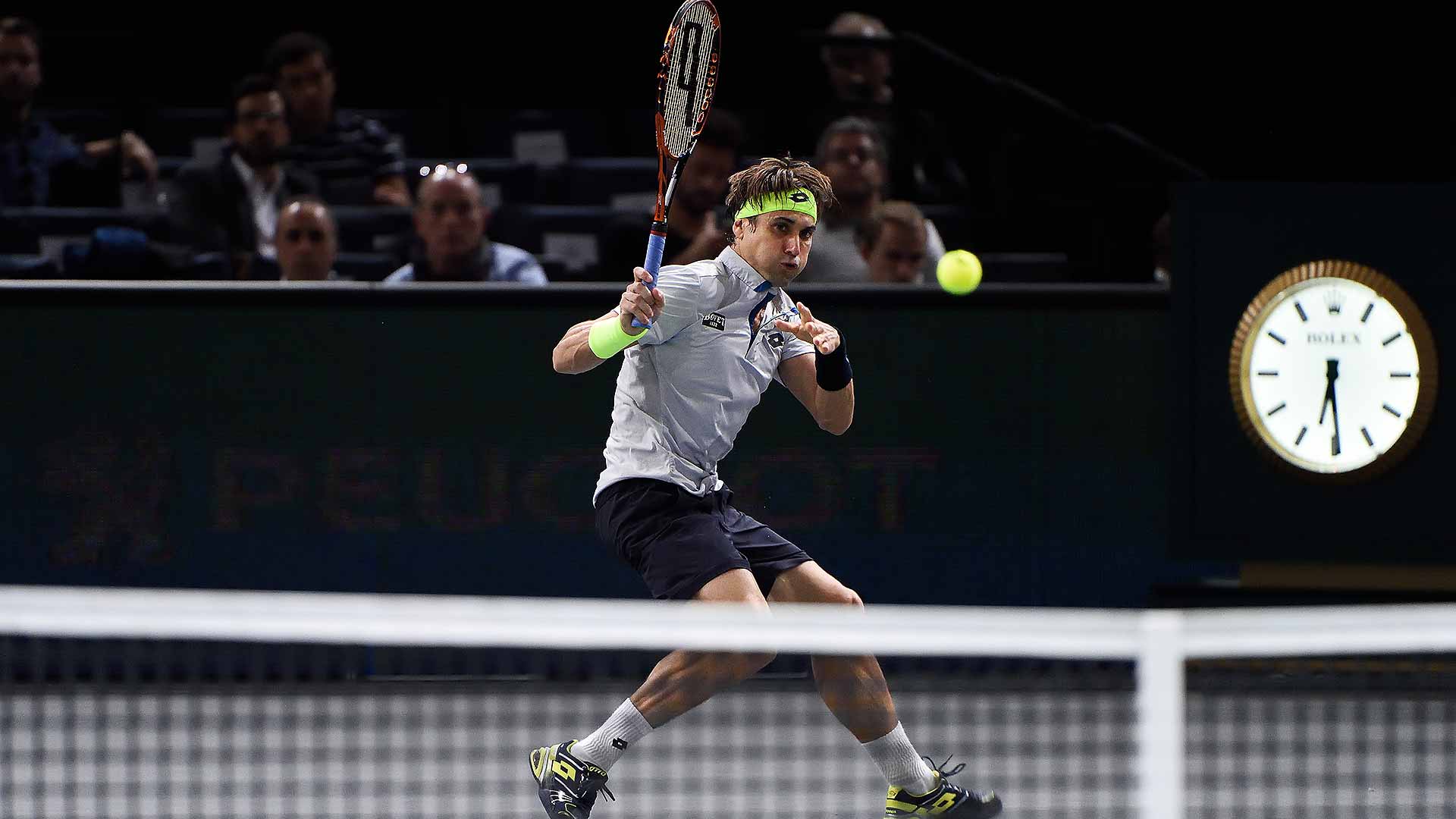 Ferrer Defuses Isner In Paris